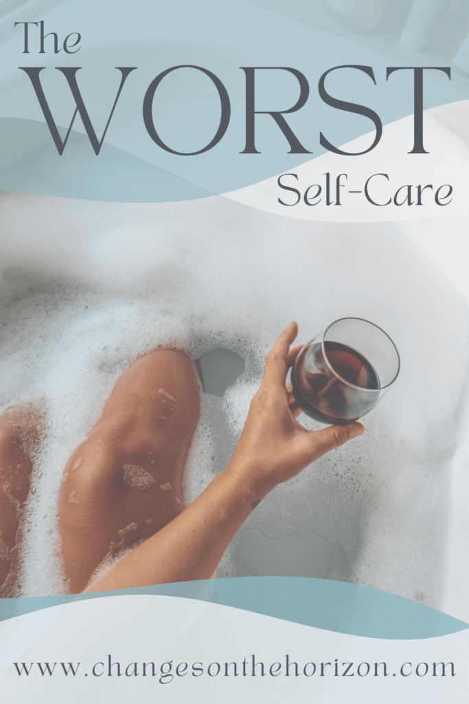 an image of what appears to be a woman in a tub but just her knees and a hand holding a glass of wine are visible with bubbles on top of the water in an attempt at self care. the title of the blog post overlay on top and the website on the bottom